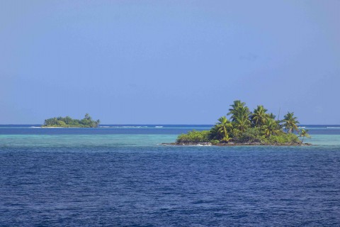 Chagos archipelago small islands from a boat