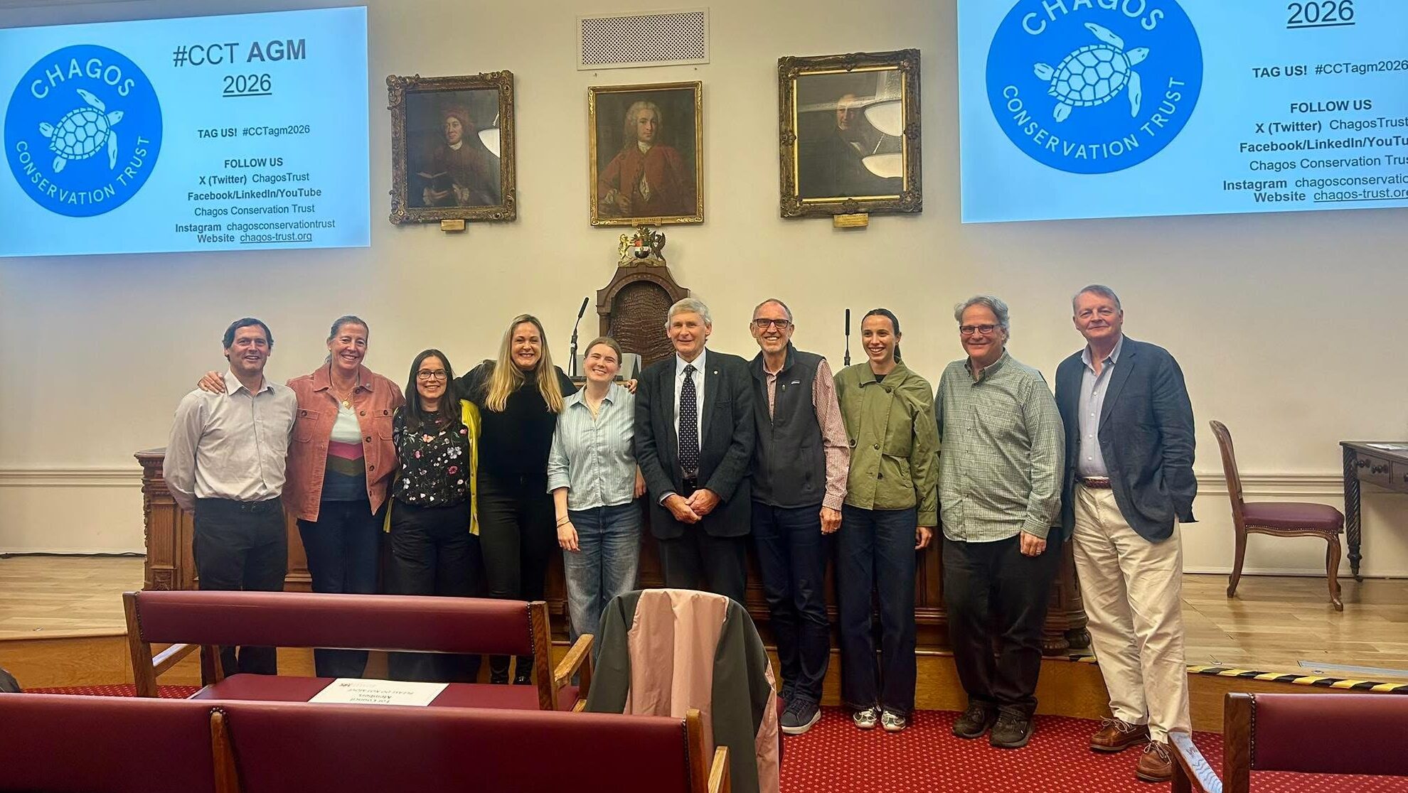 Chagos Conservation Trust board members in front of the stage at the Linnean Society